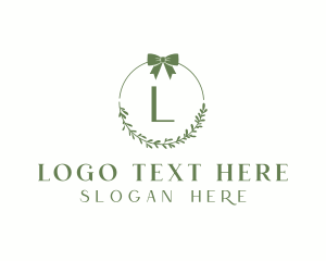 Ribbon Leaf Wreath  logo