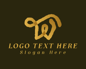 Gold Ink Letter W logo