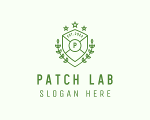 Shield Wreath Academy logo