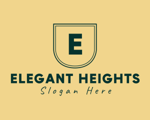 Elegant Shield Fashion Apparel logo design