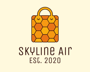 Yellow Honeycomb Bag logo