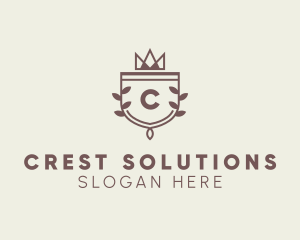 Crown Shield Leaf Crest logo