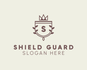 Crown Shield Leaf Crest logo design