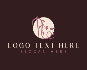 Floral Needle Vine logo