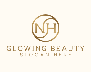 Golden Monogram Letter NH logo