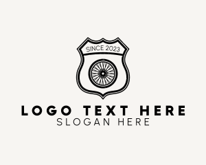 Rustic Bicycle Wheel Shield logo