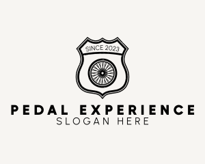 Rustic Bicycle Wheel Shield logo