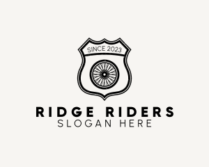 Rustic Bicycle Wheel Shield logo design