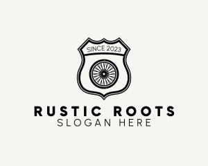 Rustic Bicycle Wheel Shield logo design