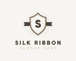 Ribbon Shield Boutique logo design