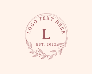 Elegant Leaf Wreath logo