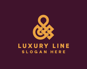 Golden Luxury Ampersand logo design