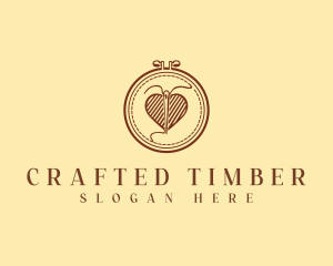 Embroidery Needle Heart logo design