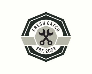 Wrench Mechanic Badge logo design