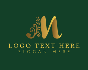 Golden Floral Letter M logo