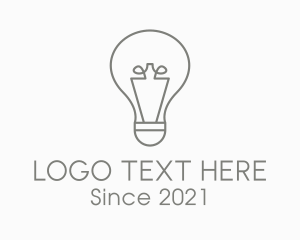 Gray Light Bulb logo