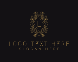 Gold Floral Ornament logo