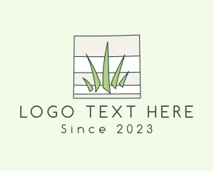 Notepad Grass Mowing logo