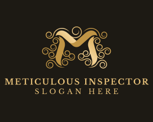 Elegant Gold Letter M logo design