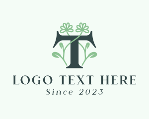 Green Floral Letter T logo