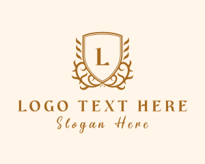 Elegant Deluxe Boutique Shield logo