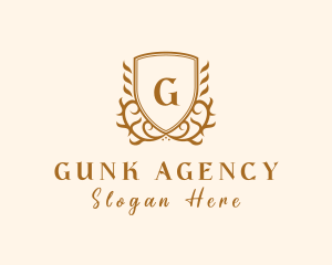 Elegant Deluxe Boutique Shield logo design