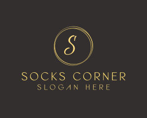 Elegant Cursive Circle logo
