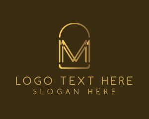 Gold Luxury Arch Letter M logo