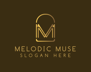 Gold Luxury Arch Letter M logo design