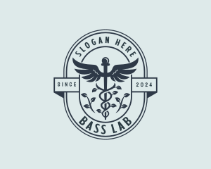 Organic Pharmacy Caduceus logo design