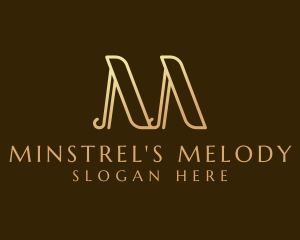 Elegant Gold Letter M logo design