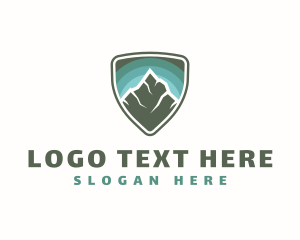 Shield - Mountain Peak Badge logo design