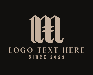 Tattoo Studio Letter M logo