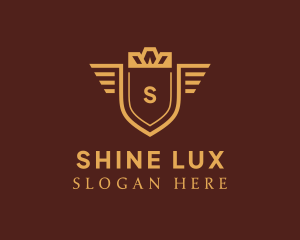 Luxe Crown Shield Wings logo design