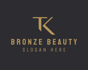 Bronze T & K Monogram logo