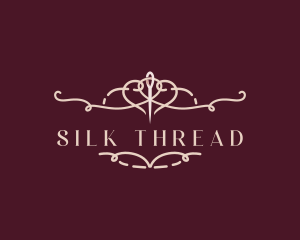 Seamstress Needle Thread logo design