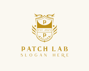 Golden Royalty Shield logo