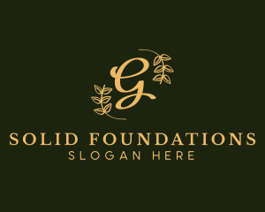 Golden Leaf Wreath logo