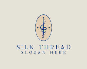 Embroidery Needle Thread logo design