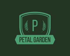 Botanical Shield Wreath logo design