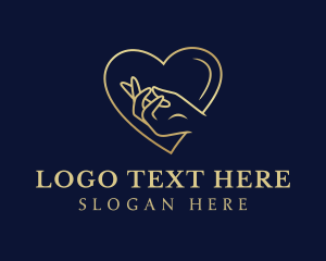 Gold Heart Hand Charity logo