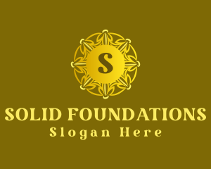 Golden Floral Wreath logo