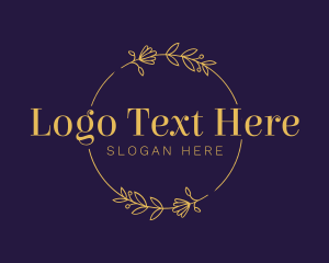 Golden Floral Wreath logo