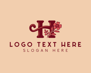 Cursive Floral Letter H logo