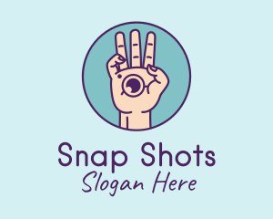 Photographer Hand Camera Lens logo
