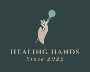 Acupuncturist Needle Hand logo design