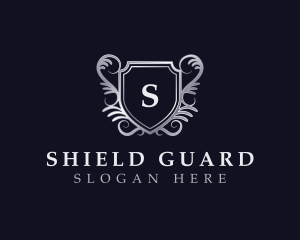 Premium Deluxe Shield logo design