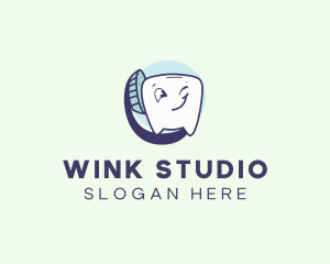 Toothbrush Tooth Wink logo design