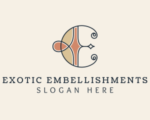 Antique Artisan Swirl Letter E logo design