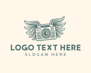Photographer Camera Wings logo